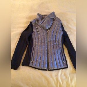 Calvin Klein Performance Lightweight grey puffer jacket with nylon sleeves.